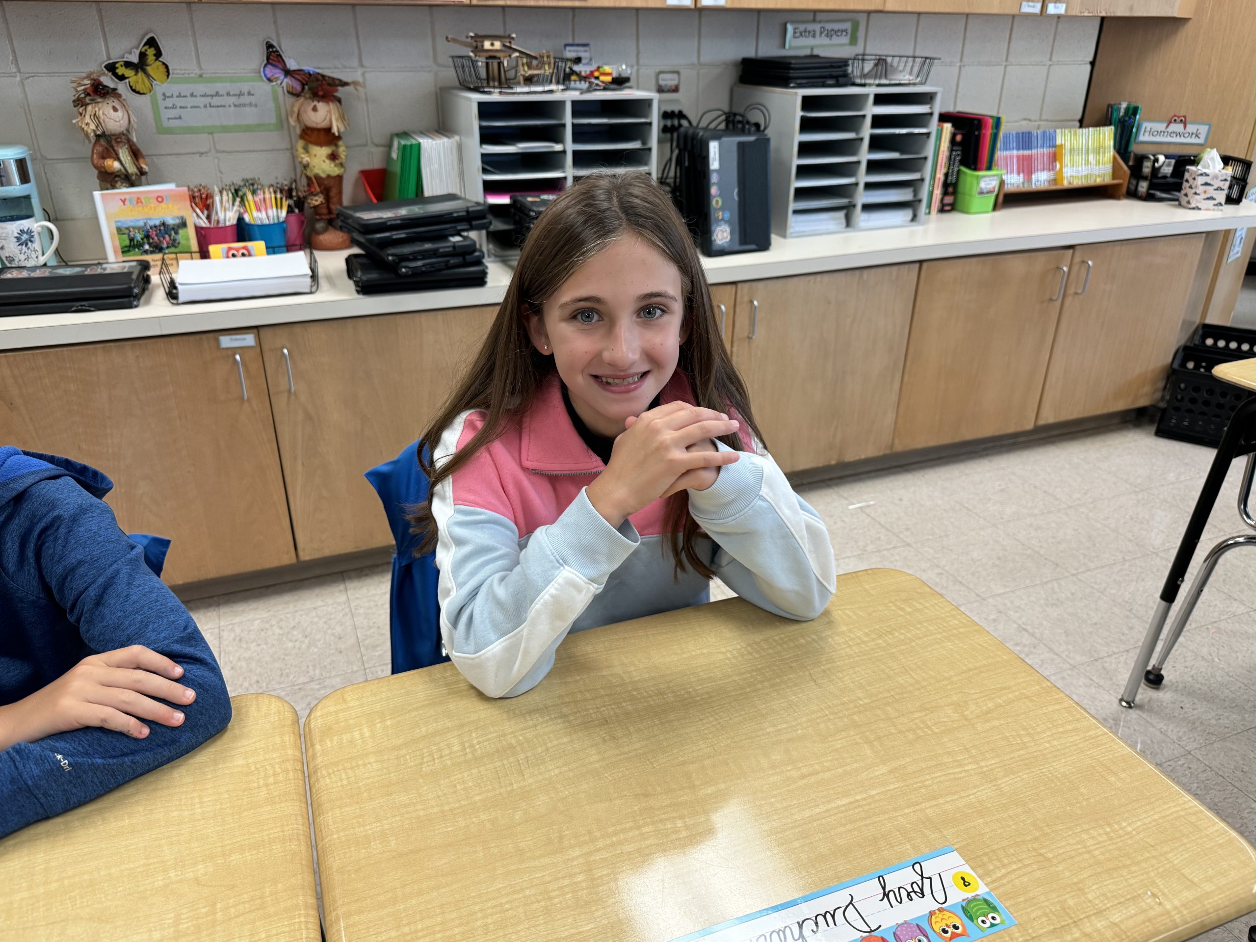 A fifth grade student in her classroom