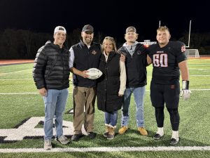 John Bowen and his family during his 100th career win.