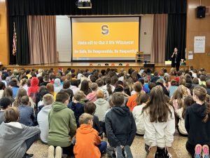 Students attend the 3Bs December assembly