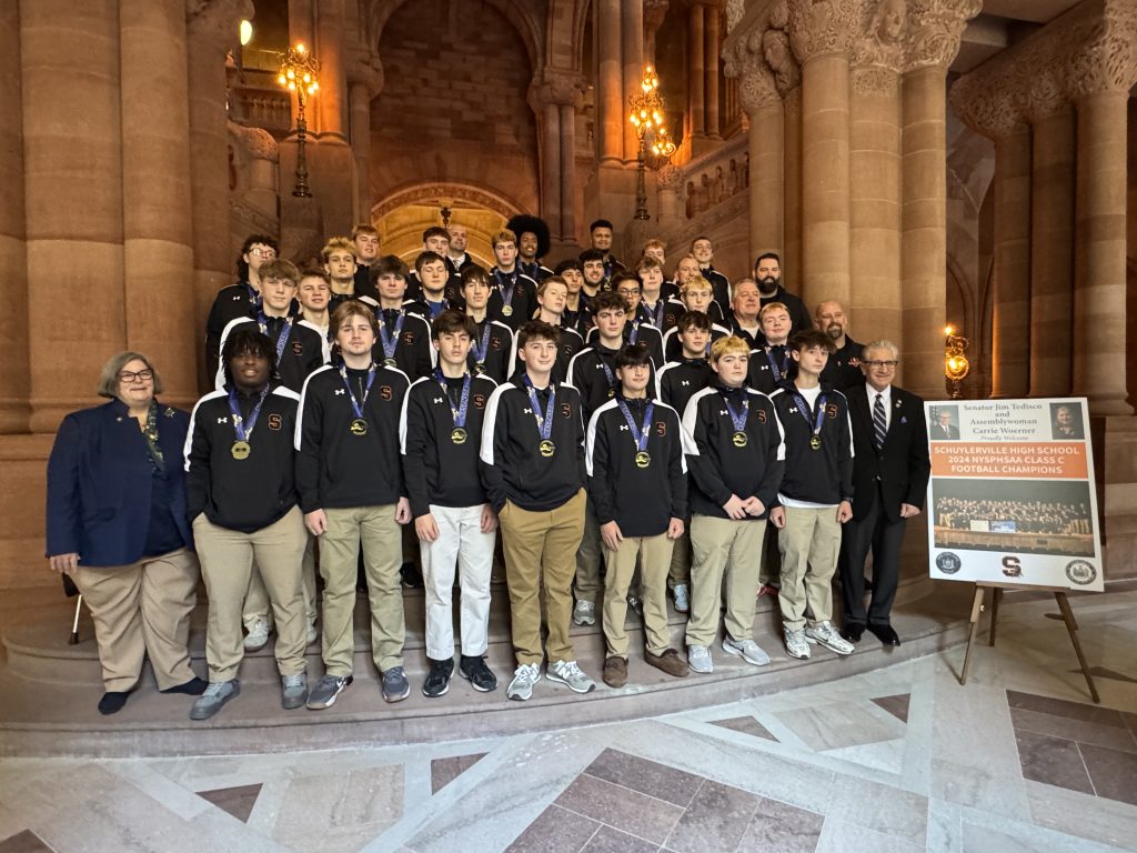 Schuylerville High School football team with Assemblywoman Carrie Woerner and Senator Jim Tedisco