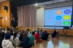 Zach Warriner presents an internet safety course to grades 3-5 elementary students.