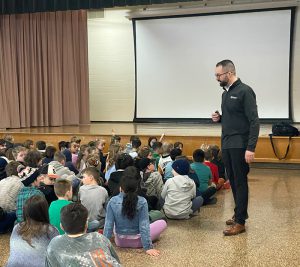 Zach Warriner presents an internet safety course to grades 3-5 elementary students.